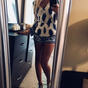 Blue and white paisley long sleeve romper